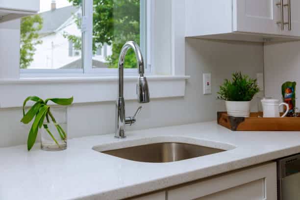 How to vent a kitchen sink under a window