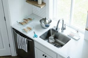 sink- How to vent a kitchen sink under a window?